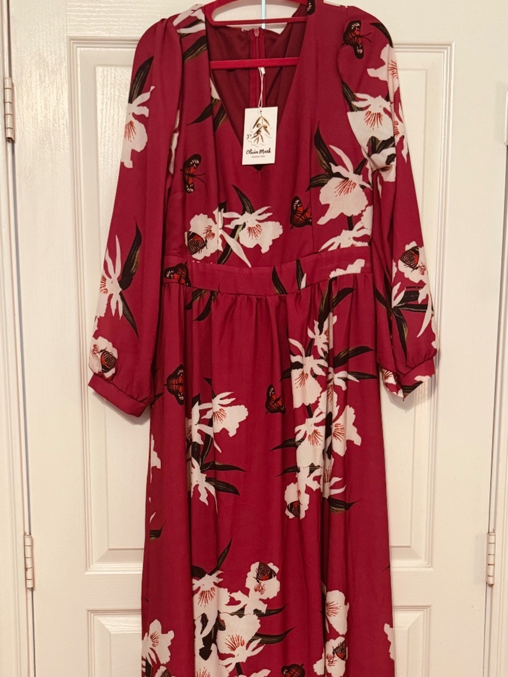 Long flowy floral v neck dress with flowers and butterfly pattern
